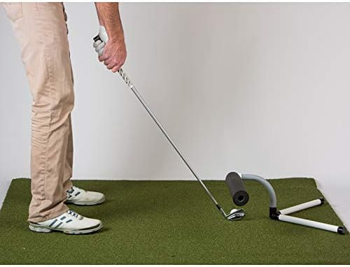 Golfer setting up to the TrueShot Golf Slice Corrector to practice an inside-out swing path and fix a slice