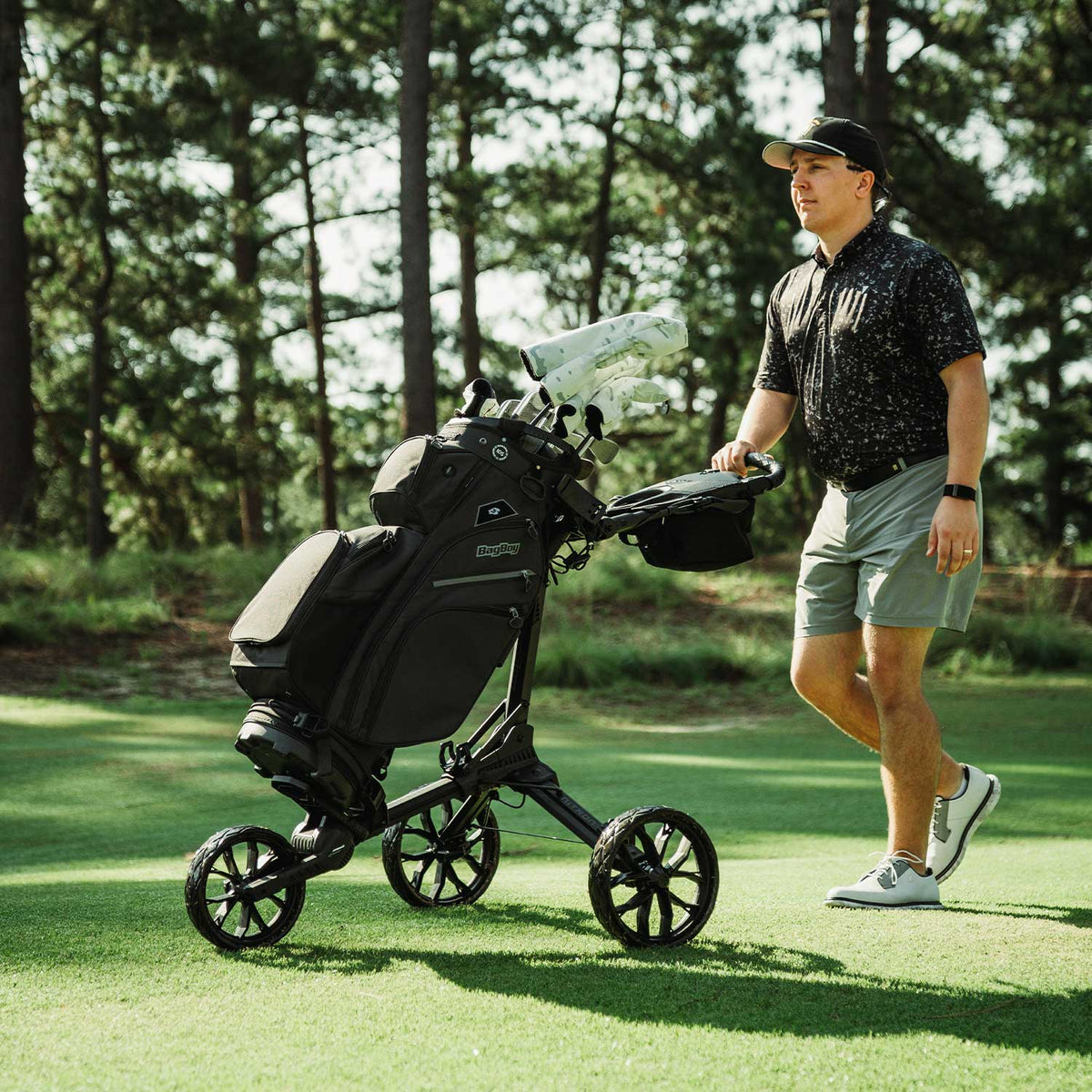 Black/Slate Bag Boy Nitron Auto-Open push cart on the golf course