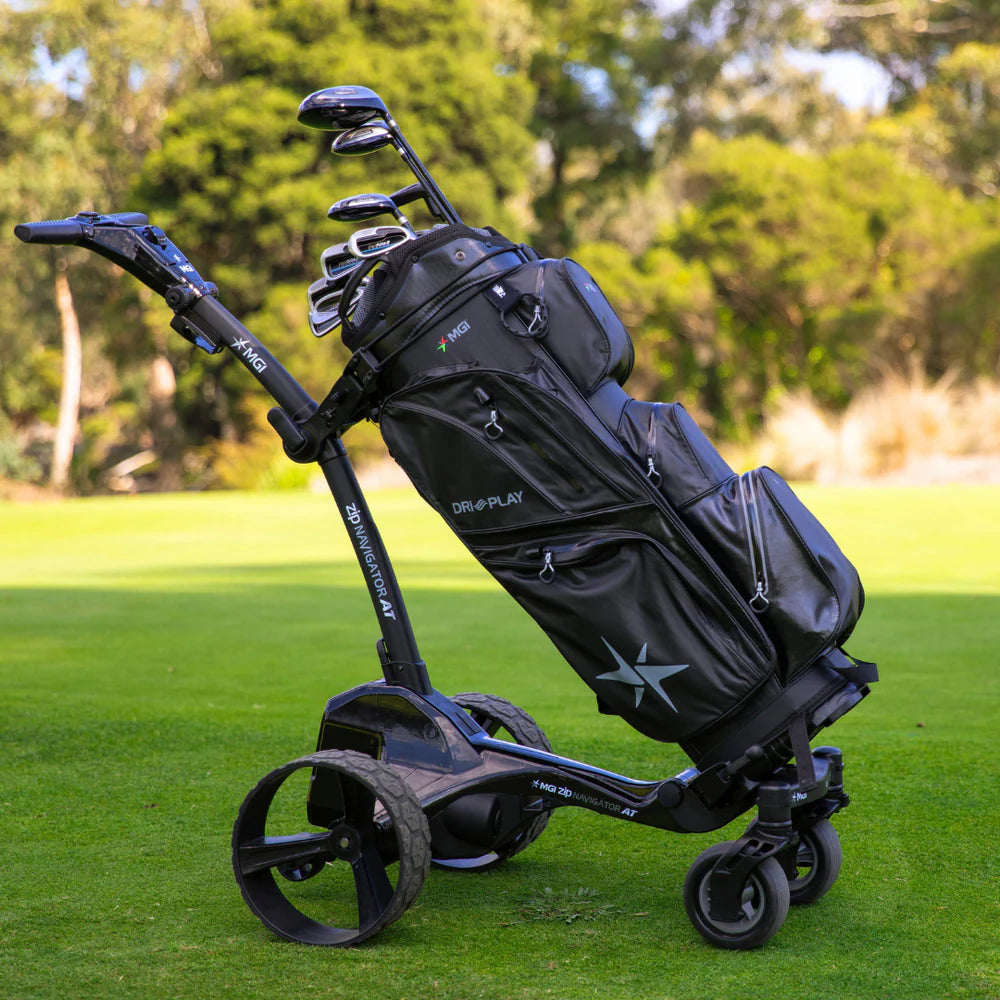 MGI Zip Navigator AT all terrain remote control electric golf caddie on the course carrying a golf bag